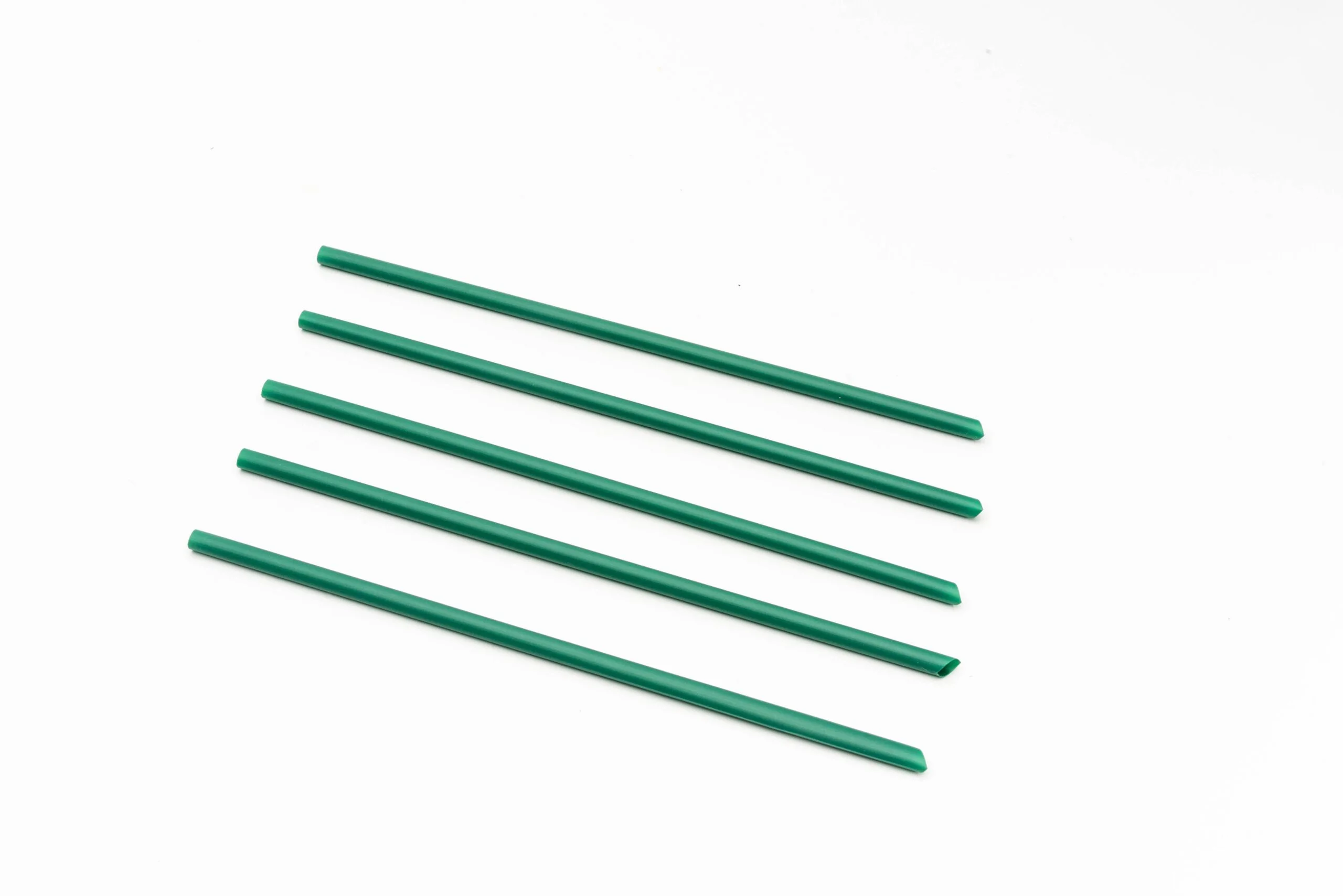 A collection of green PLA straws, signifying our commitment to environmentally-friendly and sustainable practices. These straws, made from plant-based materials, offer a perfect balance between utility and eco-responsibility.