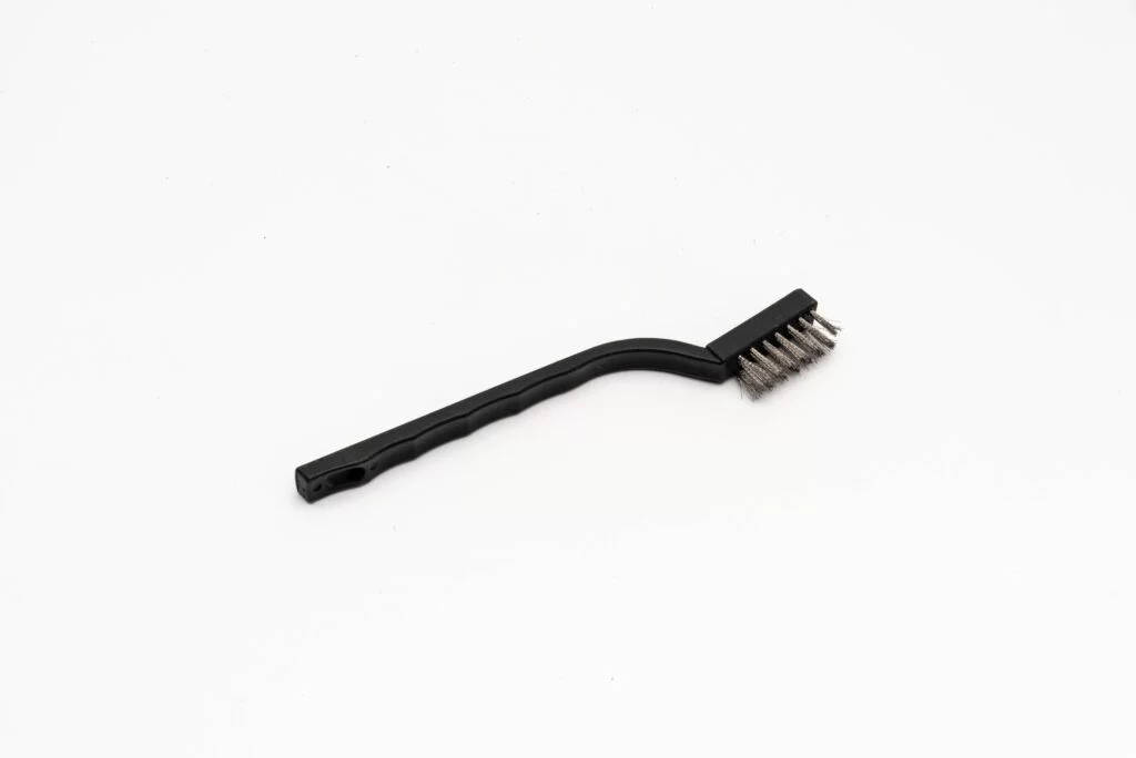 Escova de dentes de aço inoxidável com cabo de PP